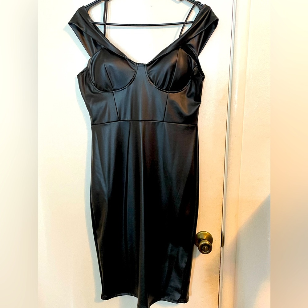 Leather black dress.